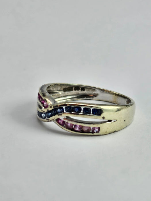 1429: Vintage: 9ct White Gold Rubies Sapphires Crossover Ring- crisp, colourful, eye candy