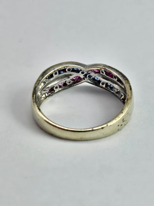 1429: Vintage: 9ct White Gold Rubies Sapphires Crossover Ring- crisp, colourful, eye candy
