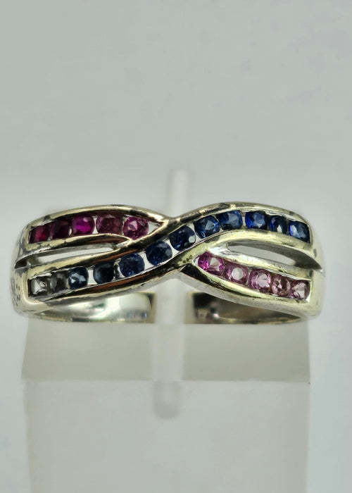 1429: Vintage: 9ct White Gold Rubies Sapphires Crossover Ring- crisp, colourful, eye candy