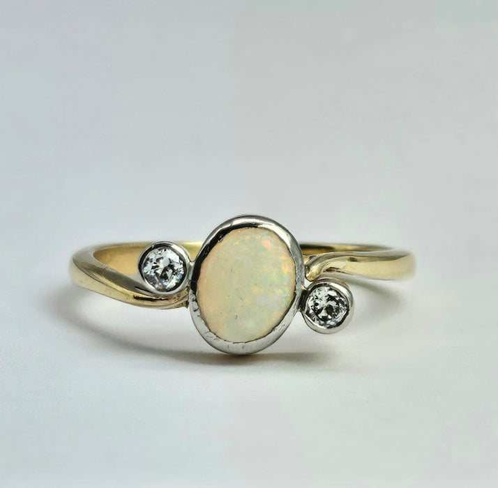 1102: Vintage; 18ct Gold White Opal Twin Diamonds Dress Ring- cute, colourful, sparkling