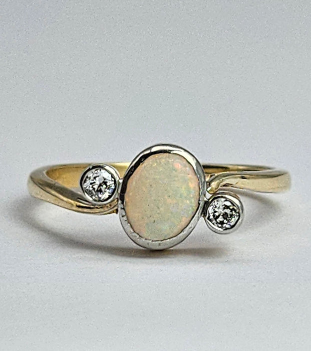 1102: Vintage; 18ct Gold White Opal Twin Diamonds Dress Ring- cute, colourful, sparkling