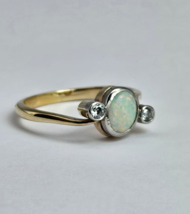 1102: Vintage; 18ct Gold White Opal Twin Diamonds Dress Ring- cute, colourful, sparkling