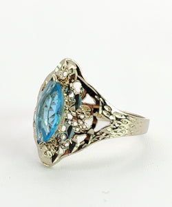 1556: Vintage: 14ct White Gold Marquise Cut Blue Topaz Openwork Dress Ring