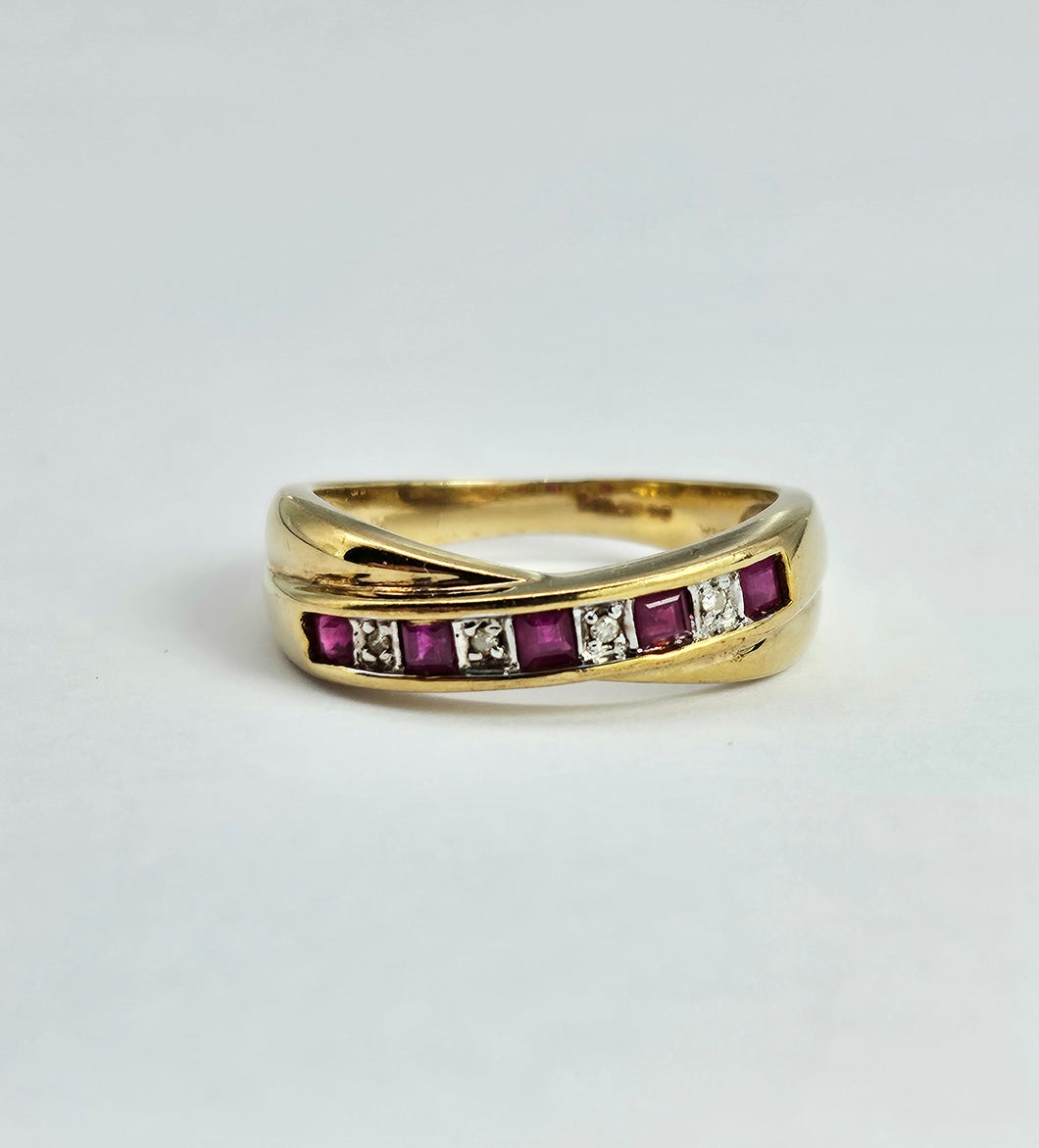 1380: Vintage: 9ct Gold Rubies Diamonds Crossover Ring- sparkling symmetry