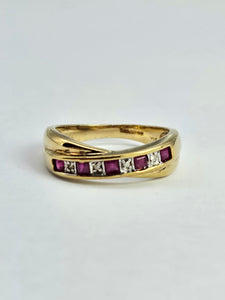 1380: Vintage: 9ct Gold Rubies Diamonds Crossover Ring- sparkling symmetry