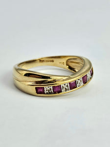 1380: Vintage: 9ct Gold Rubies Diamonds Crossover Ring- sparkling symmetry