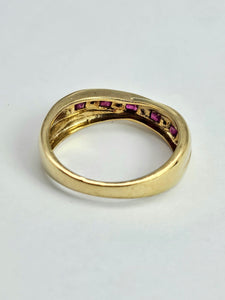 1380: Vintage: 9ct Gold Rubies Diamonds Crossover Ring- sparkling symmetry