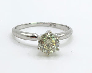 1702: Vintage: 14ct White Gold Brilliant Cut Diamond Solitaire; sparkling natural diamond