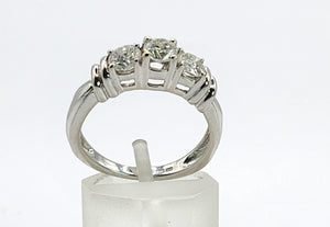 1704:   Modern: 14ct White Gold Brilliant & Round Full Cut Diamonds Trilogy- 0.81ct of natural, sparkling diamonds