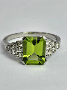 1805: Vintage: Platinum Emerald Cut Peridot Diamonds Ring- crisp, sparkling, eye candy