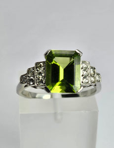 1805: Vintage: Platinum Emerald Cut Peridot Diamonds Ring- crisp, sparkling, eye candy