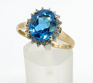 1650: Vintage: 9ct Gold Swiss Blue Topaz 18 Diamonds Cluster Ring- sparkling beauty