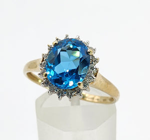 1650: Vintage: 9ct Gold Swiss Blue Topaz 18 Diamonds Cluster Ring- sparkling beauty