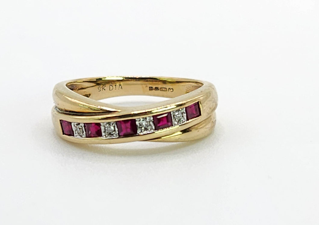 1663: Vintage: 9ct Gold Rubies Diamonds Crossover Ring- classic design.