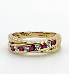 1663: Vintage: 9ct Gold Rubies Diamonds Crossover Ring- classic design.
