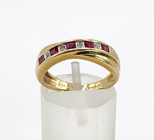 1663: Vintage: 9ct Gold Rubies Diamonds Crossover Ring- classic design.