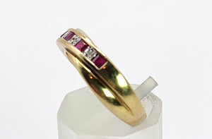 1663: Vintage: 9ct Gold Rubies Diamonds Crossover Ring- classic design.