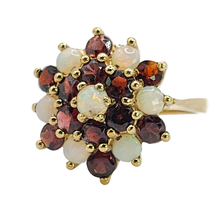 1596: Vintage:&nbsp; 9ct Gold White Opals Red Garnets Flowerhead Cluster Ring- From 1972