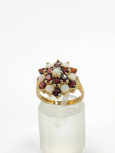 1596: Vintage:&nbsp; 9ct Gold White Opals Red Garnets Flowerhead Cluster Ring- From 1972