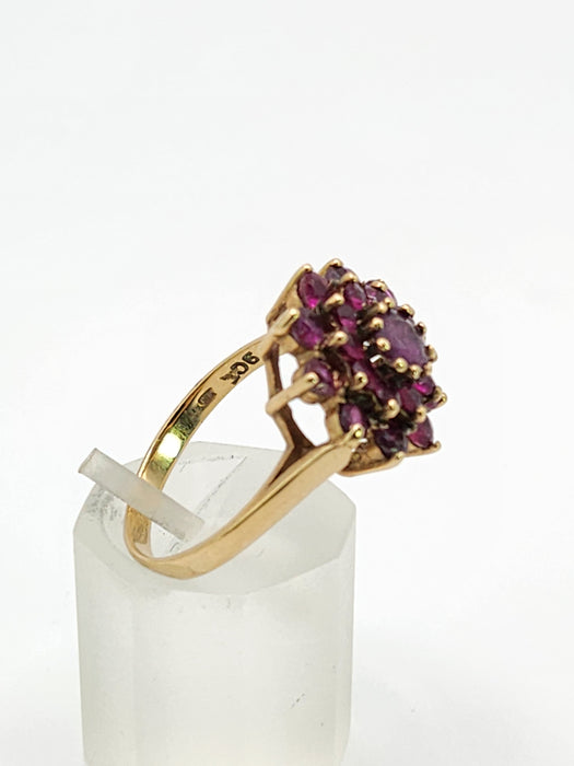 6438: Vintage; 9ct Gold 21 Rubies Flower Head Cocktail Ring- From 1979