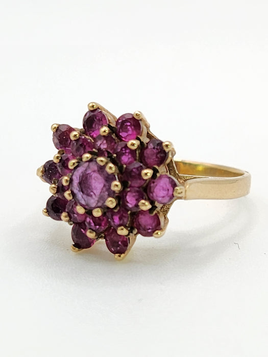6438: Vintage; 9ct Gold 21 Rubies Flower Head Cocktail Ring- From 1979
