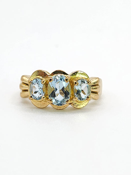 1980: Vintage; 9ct Gold Blue Aquamarines Trilogy Ring- beautifully balanced blue