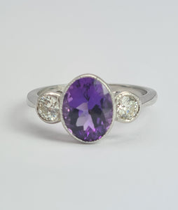 1955: Vintage: Platinum Amethyst (1.64ct) Diamonds (0.5ct) 3-Stone Straight Ring- an absolute beauty.
