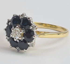 1966: Vintage; 18ct Gold Australian Blue Sapphires Natural Diamonds Flower Head Ring- voluptuous style