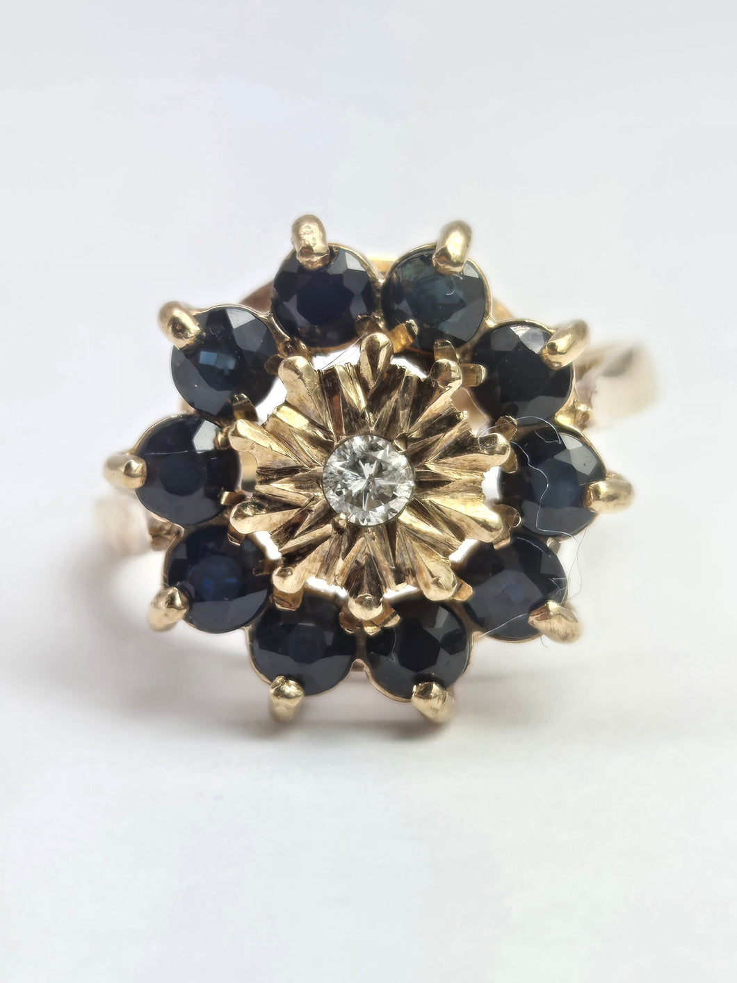 2121: Vintage: 9ct Gold Diamond Blue Sapphires Diamonds Flower Head Ring- from 1980