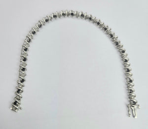 2110: Vintage; 9ct Gold Swiss Blue Topaz Natural Diamonds Bracelet (18.5cm)