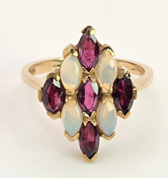 2152: Vintage: 9ct Gold Almandine Garnets White Opals Geometric Set Ring