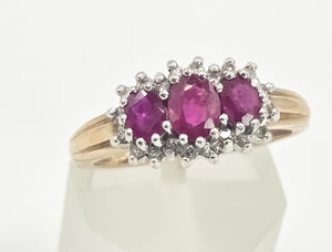 2180: Vintage: 9ct Gold Rich Red Ruby Trilogy 18 Diamonds Dress Ring