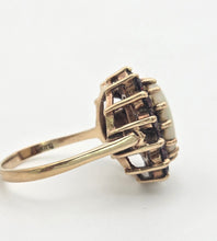 Cargar imagen en el visor de la galería, Vintage: Classic 9ct Gold White Opal 14 Red Garnets Flower Head Ring
