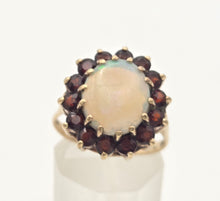 Cargar imagen en el visor de la galería, Vintage: Classic 9ct Gold White Opal 14 Red Garnets Flower Head Ring

