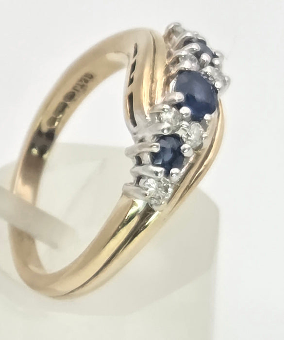 2249 Vintage: 9ct Gold Cornflower Blue Sapphires Natural Diamonds Crossover Ring