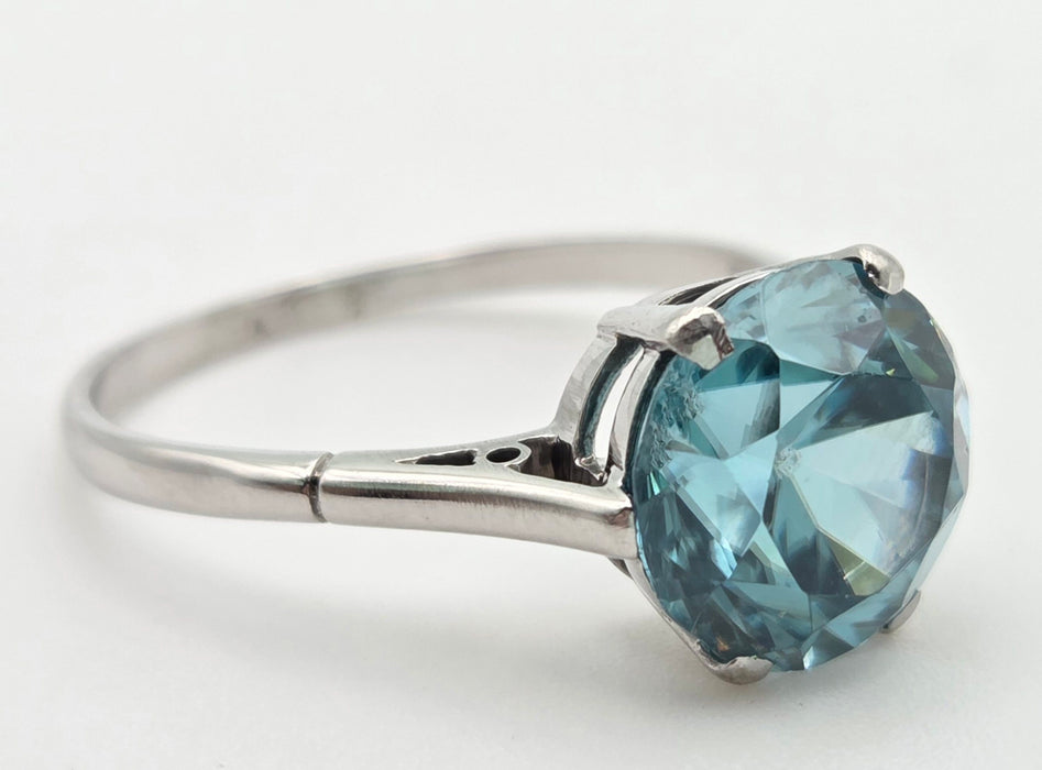 2191 Platinum Round Faceted Cut Blue Zircon Single Stone Ring
