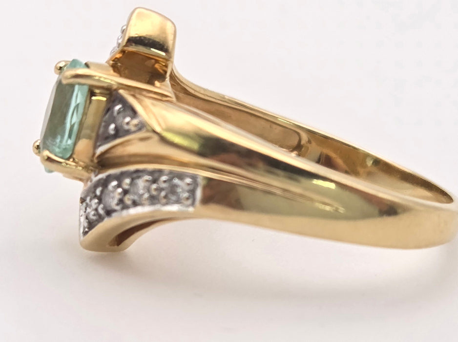 6416: 18ct Gold Blue Aquamarine  Diamonds Bypass Cocktail Ring
