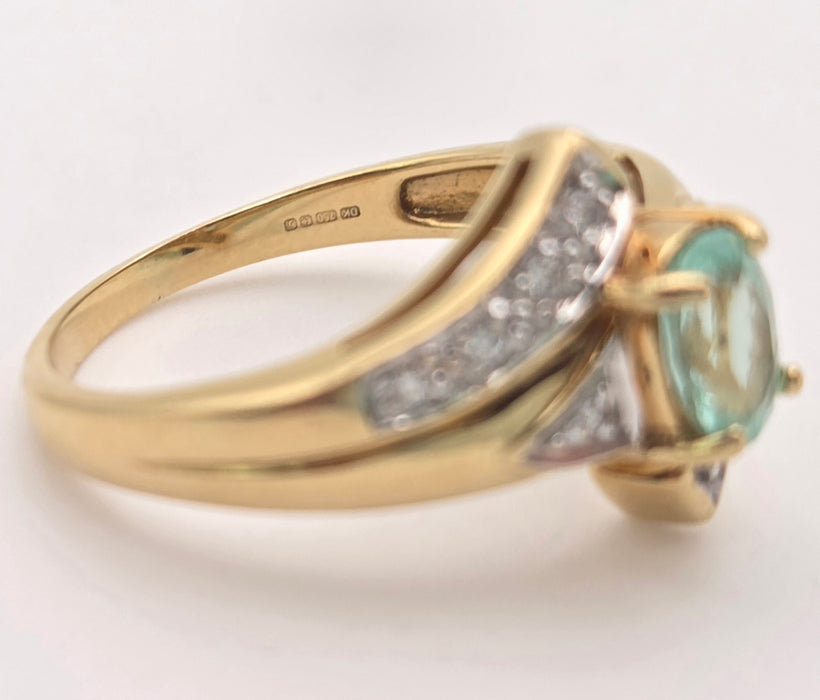 6416: 18ct Gold Blue Aquamarine  Diamonds Bypass Cocktail Ring