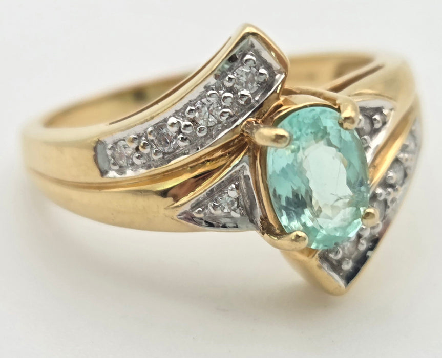 6416: 18ct Gold Blue Aquamarine  Diamonds Bypass Cocktail Ring