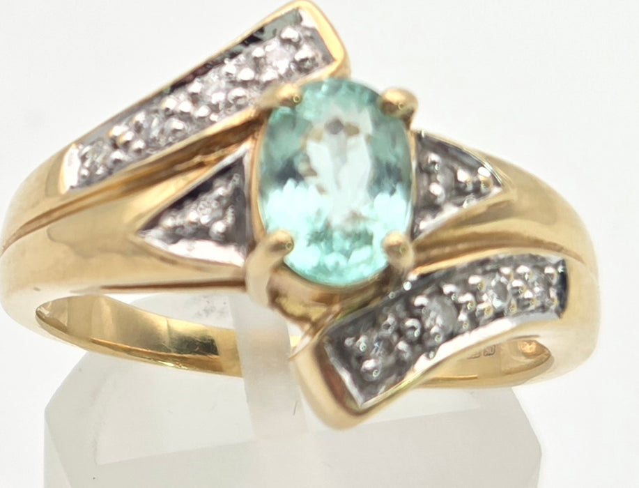 6416: 18ct Gold Blue Aquamarine  Diamonds Bypass Cocktail Ring