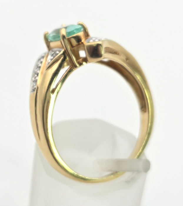 6416: 18ct Gold Blue Aquamarine  Diamonds Bypass Cocktail Ring