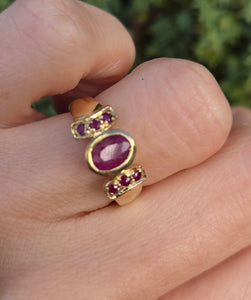6249 Vintage: 9ct Gold 7 Rubies Geometric Set Ring