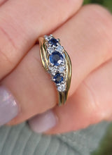 Load image into Gallery viewer, 2249 Vintage: 9ct Gold Cornflower Blue Sapphires Natural Diamonds Crossover Ring

