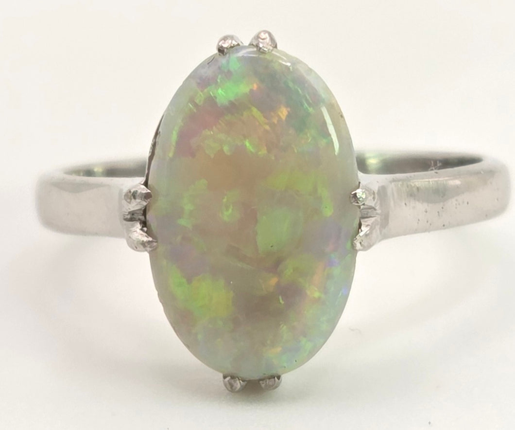 2469: Vintage 14ct White Gold Vibrant White Opal Solitaire Ring