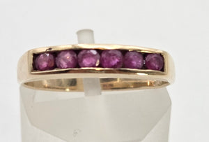 2508- Vintage: 9ct Gold 6 Channel Set Rubies Stacker/Half- Eternity Ring