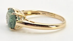 2495: Vintage 14ct Gold Rare Oval  Faceted Green Garnet Solitaire