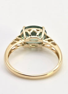 2495: Vintage 14ct Gold Rare Oval  Faceted Green Garnet Solitaire