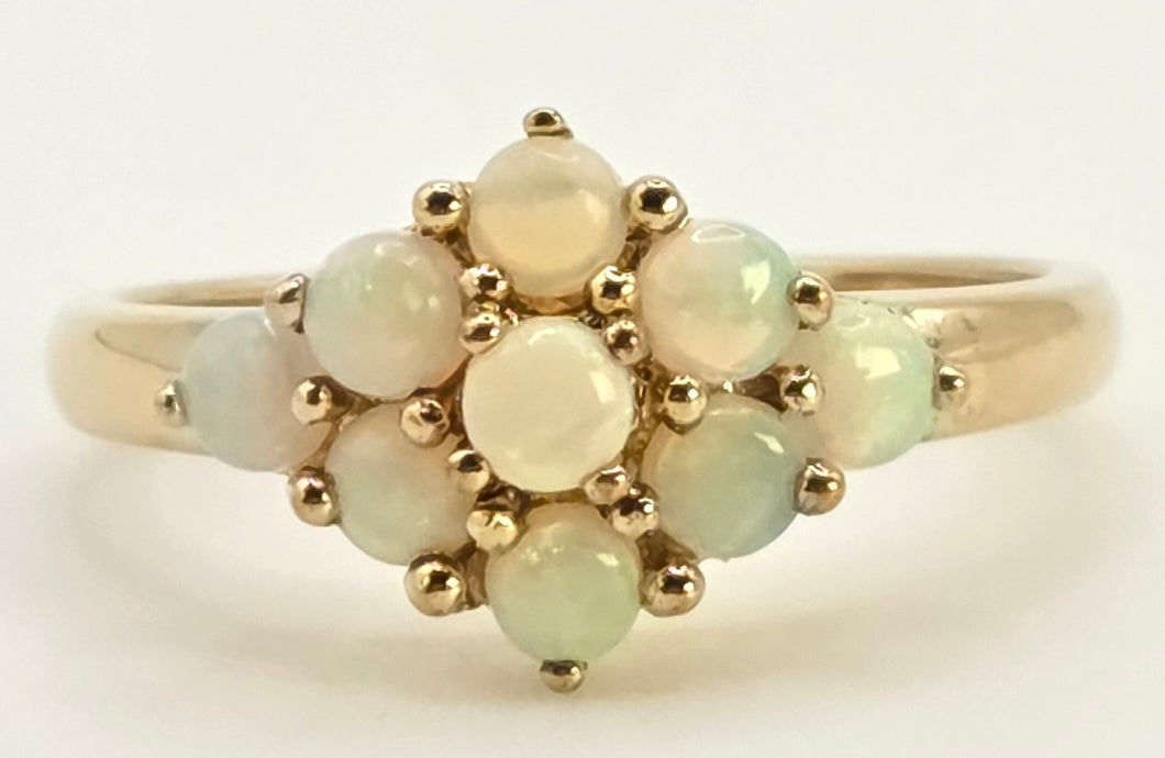 2539: Vintage Petite 9 Cabochon Cut White Opals Flower Head Ring