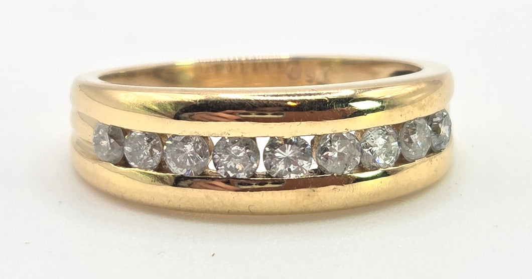 2374: Vintage; 18ct Gold 9 Natural Round Full Cut Diamonds (0.5ct) Channel Set Ring