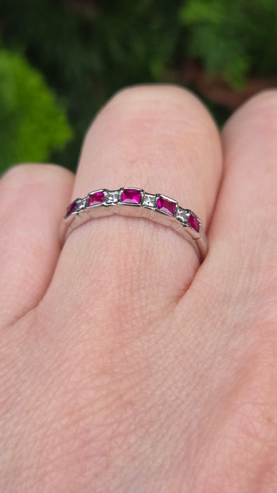 6374 Vintage: 18ct White Gold Ruby & Diamond Half Eternity Ring